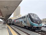 Amtrak Pacific Surfliner Train and Metrolink train sitting next to each other